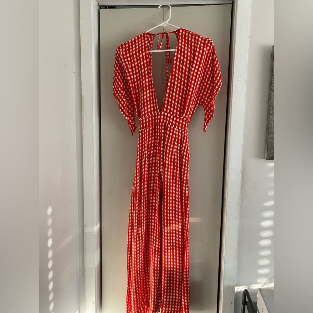 Red gingham jumpsuit from Faithfull the Brand